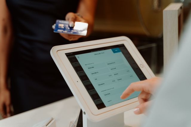 credit card presented at a checkout